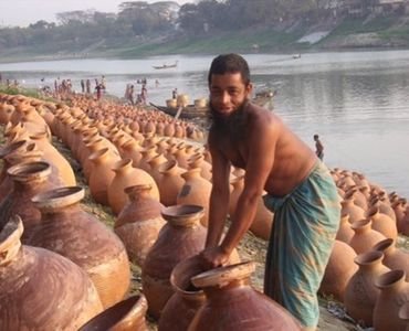Fermenting fish being soaked with punti oil.jpg