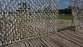Fish drying on bamboo racks 1, Lamakazi, Sylhet, Bangladesh.jpg