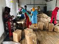 Women labourers are packing dried fish for export.jpg