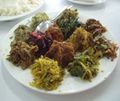 Small plate of prepared dry and fermented fish.jpg