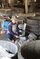 A woman making Prahok in Cambodia.jpg